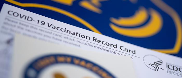 A CDC COVID-19 Vaccination Record Card 
